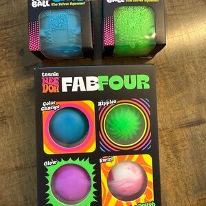 NeedDoh lot of two wild cats and and Fab Four balls